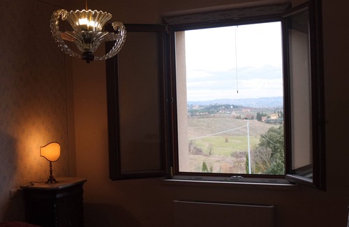 San Gimignano Apartamento | Gina, apartamento con vistas a las colinas de San Gimignano
