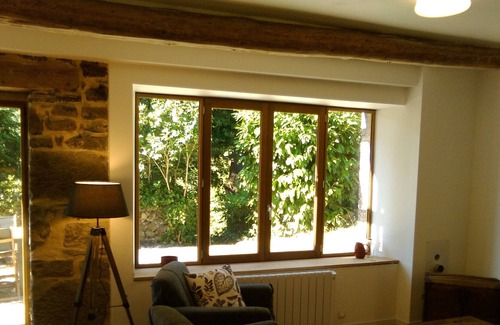 Murol Apartamento | Gite MUROL - Atelier de Charpentier - vista al castillo - hermoso jardín