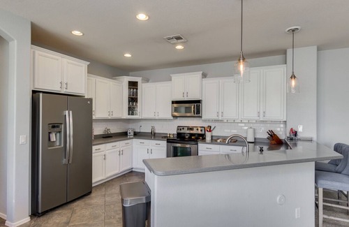 Rovey Farm Estates Casa | 4 bdrm, 5 beds: Heated pool located 2 miles to State Farm Stadium.