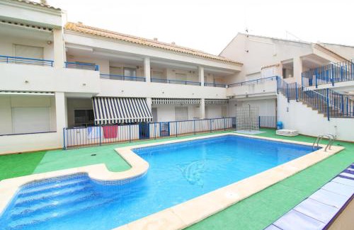 Playa de Almarda Apartamento | Global Properties, Apartamento con piscina en playa Corinto