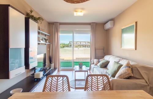 Playa de Almarda Apartamento | Global Properties: Planta baja con piscina en Almenara