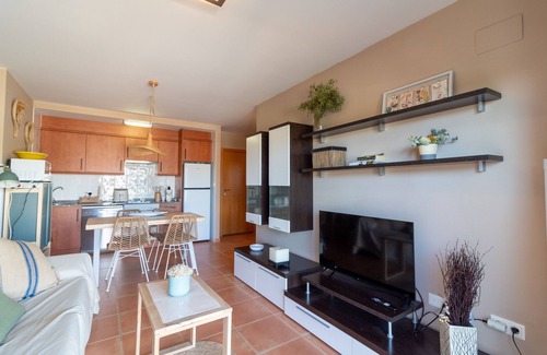 Playa de Almarda Apartamento | Global Properties: Planta baja con piscina en Almenara