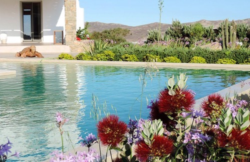 Tourlos Villa | Glorious Mykonos Villa | Villa Demelza | 5 Bedrooms | Spacious Furnished Sun Terrace | Private Outdoor Heated Pool | BBQ Facilities | Shaded Outdoor Dining Area | Private Gym | Agia Sofia, Tourlos