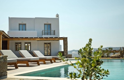 Tourlos Villa | Glorious Mykonos Villa | Villa Demelza | 5 Bedrooms | Spacious Furnished Sun Terrace | Private Outdoor Heated Pool | BBQ Facilities | Shaded Outdoor Dining Area | Private Gym | Agia Sofia, Tourlos