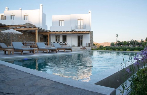 Tourlos Villa | Glorious Mykonos Villa | Villa Demelza | 5 Bedrooms | Spacious Furnished Sun Terrace | Private Outdoor Heated Pool | BBQ Facilities | Shaded Outdoor Dining Area | Private Gym | Agia Sofia, Tourlos