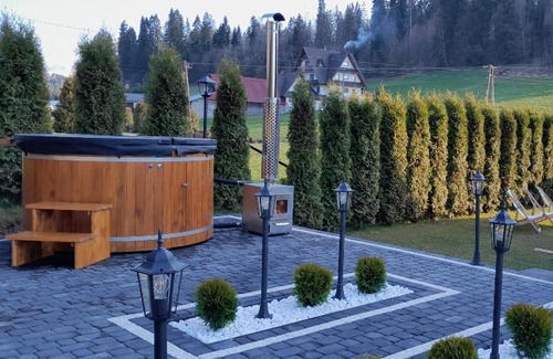Brzegi Casa | Gościniec Grandel domek z balią