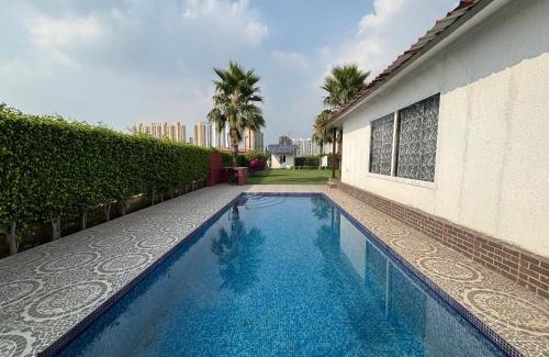 Noida Casa | GoBravo 48 -2BHK Farm with Pool & Lawn Sector 150 Noida