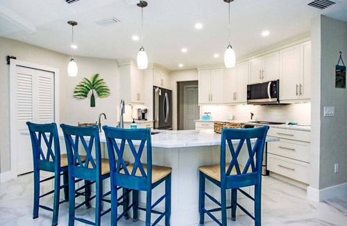 Beachview Country Club Estates Casa | Golf course pool home on 12th hole of the Sanibel Island Golf Club - Isle Awhile