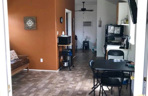 Matagorda Cabina | Gone Coastal is part of a mini resort with pool, bbq area, firepit.