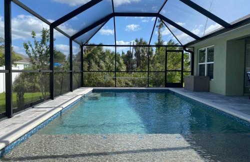 North Port Casa | Gone Coastal! Large Heated pool home 30 min from beaches!