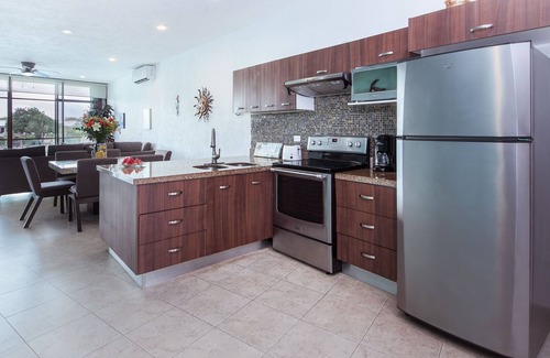 Puerto Aventuras Condominio | SEP -DEC Special, Lagoon Condo, Carrito de golf, Membresía Omni Beach Club, Wi-Fi