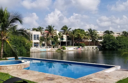 Puerto Aventuras Condominio | SEP -DEC Special, Lagoon Condo, Carrito de golf, Membresía Omni Beach Club, Wi-Fi