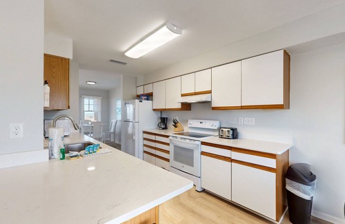 Buxton Casa | Gorgeous ocean-view townhouse with central AC, private W/D, patio, & pool access