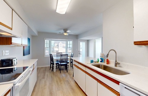 Buxton Casa | Gorgeous ocean-view townhouse with central AC, private W/D, patio, & pool access