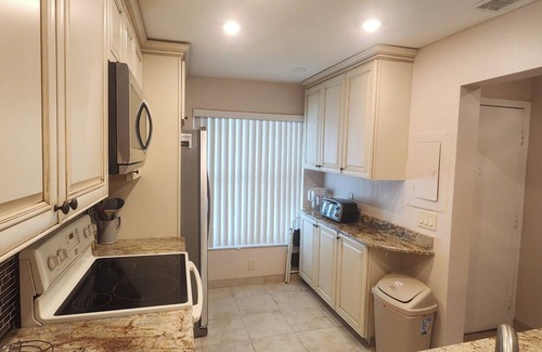 Casa del Mar Condominio | Gorgeous Second Floor Waterfront Villa with Sunset views over Boca Ciega Bay!