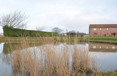 Maltby le Marsh Cabaña | Grange Farm LAKE VIEW 2 - Una cabaña de 2 dormitorios para dormir 4 con jacuzzi privado