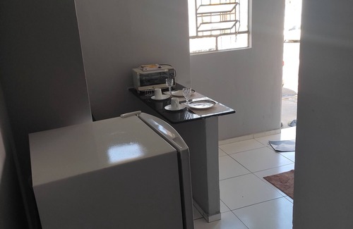 Centro Casa | Gray house in the city center, close to hospitals