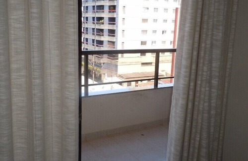 Guarapari Apartamento | Gran apartamento con 2 dormitorios 1 suite, garaje y balcón con vistas al mar