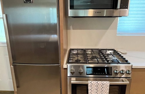 Encanto Condominio | Great Location with Sparkling Pool! Midtown-Park Central