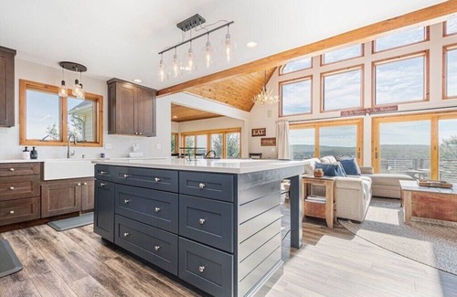 Waterfront Greens Casa | Renovated Home with great VIEWS! Boat dock, hot tub, dog friendly, golf course.