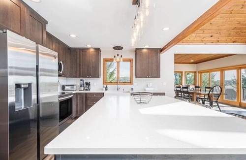 Waterfront Greens Casa | Renovated Home with great VIEWS! Boat dock, hot tub, dog friendly, golf course.