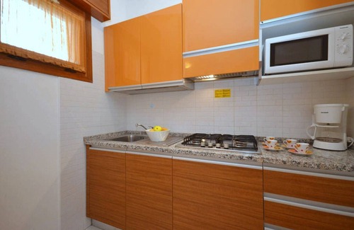 Bibione Apartamento | Gran pueblo renovado con piscina.