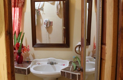 Armenia Casa | Green Oasis Ranch: A Botanical Escape in Belize