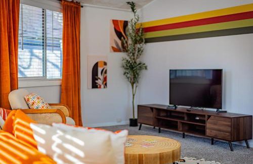 West End Casa | Groovy Getaway with Fenced Yard