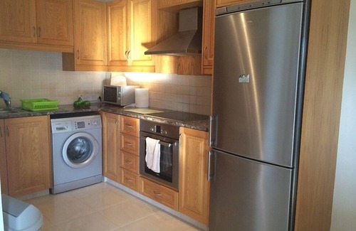 Paphos Apartamento | Apartamento en planta baja con piscina, aire acondicionado, TV, DVD, WIFI, patio y estacionamiento privado