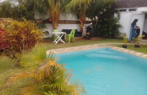 Pointe aux Biches Apartamento | Groundfloor Apartment and Firstfloor Apartment with charming pool near sandy beach and commerces nearby