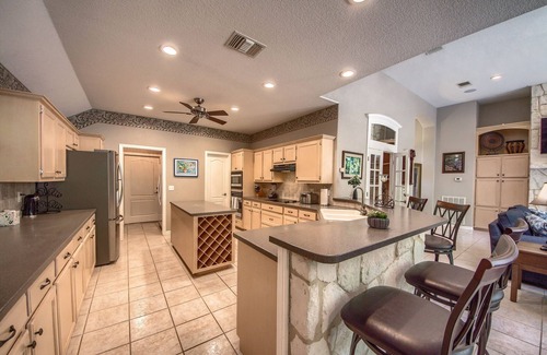 New Braunfels Casa | Guadalupe Riverfront Home! Multi level deck, fire pit. pool table & 2 dogs!