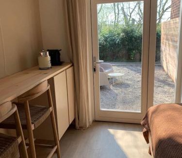 Municipality of Texel Cama Y Desayuno | Guest room with terrace at the Wadden Sea