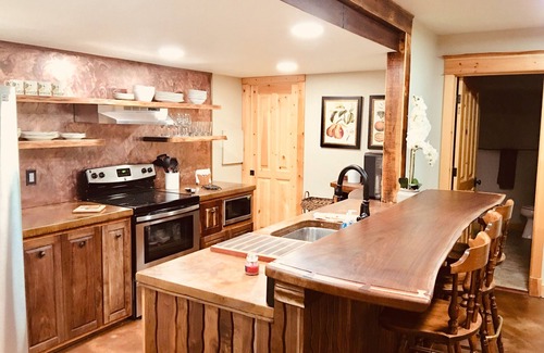 Missoula Casa | Guest suite attached to log home in the FOREST