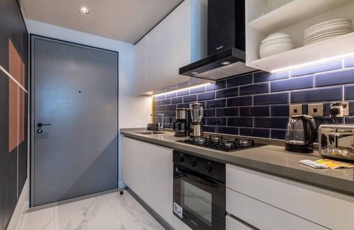 Downtown Dubai Apartamento | GuestReady - Caballeros del cielo