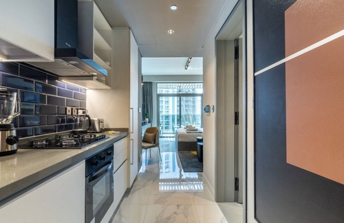 Downtown Dubai Apartamento | GuestReady - Caballeros del cielo