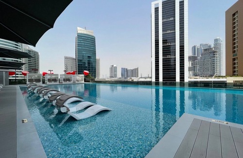 Downtown Dubai Apartamento | GuestReady - Caballeros del cielo