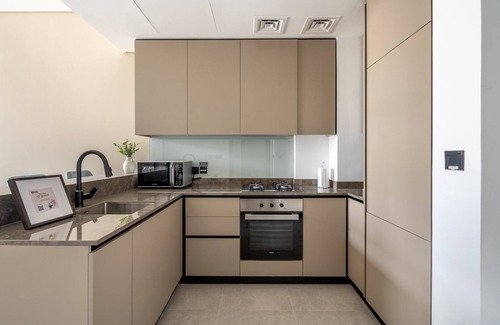 Business Bay Apartamento | GuestReady - Majestuosas vistas al canal y al Burj Khalifa