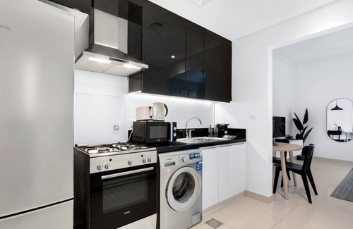 Business Bay Apartamento | GuestReady - Modern living at Capital Bay
