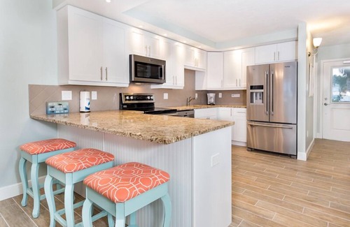 Sanibel Condominio | Frente al golfo Condo! Condominio brillante, tropical en la playa!