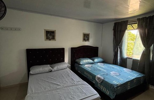 Puerto Triunfo Apartamento | Habitación la esmeralda
