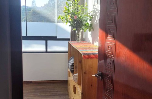 Cusco Casa | Habitación Munay rodeada de naturaleza a 15 minutos del Centro Histórico
