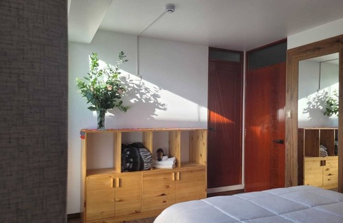 Cusco Casa | Habitación Munay rodeada de naturaleza a 15 minutos del Centro Histórico
