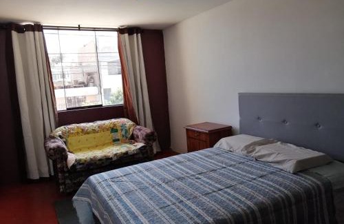 Cerro Colorado District Casa | Habitación Privada en casa familiar