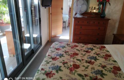 Burriana Casa | Habitacion Familiar en un Ático con gran terraza y,cocina ,en la playa