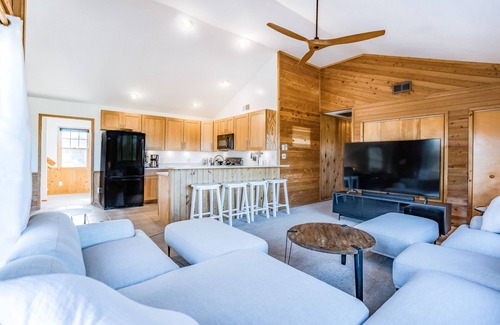 Palisade Acres Casa | Handsome raised home with private hot tub, & central AC