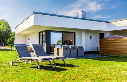Schwerin Apartamento | Hangar 19 Luxusbungalow am See mit Kamin 3