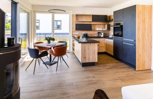 Schwerin Apartamento | Hangar 19 Luxusbungalow am See mit Kamin 3