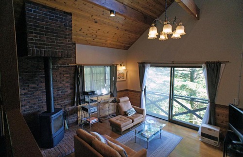Nasu Casa | HARUNA SKY Panoramic view of Nasu,private space surrounded by fir trees,relaxing stone bath,watching movies on a 120inch big screen