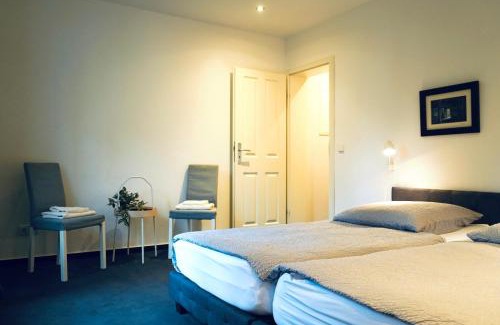 Stadtmitte Apartamento | Haus im Grünen für 6 Personen-3 Schlafzimmer- 3 Bädern -Waschmaschine-große Terrasse- vollausgestattete Küche