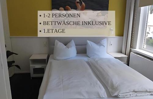 Wremen Apartamento | Haus Krabbe Apartments, zentral gelegen zwischen Bremerhaven und Cuxhaven, Hunde kostenfrei willkommen, hauseigene kostenfreie Parkplätze, Unterstellmöglichkeit für Fahrräder und E-Bikes